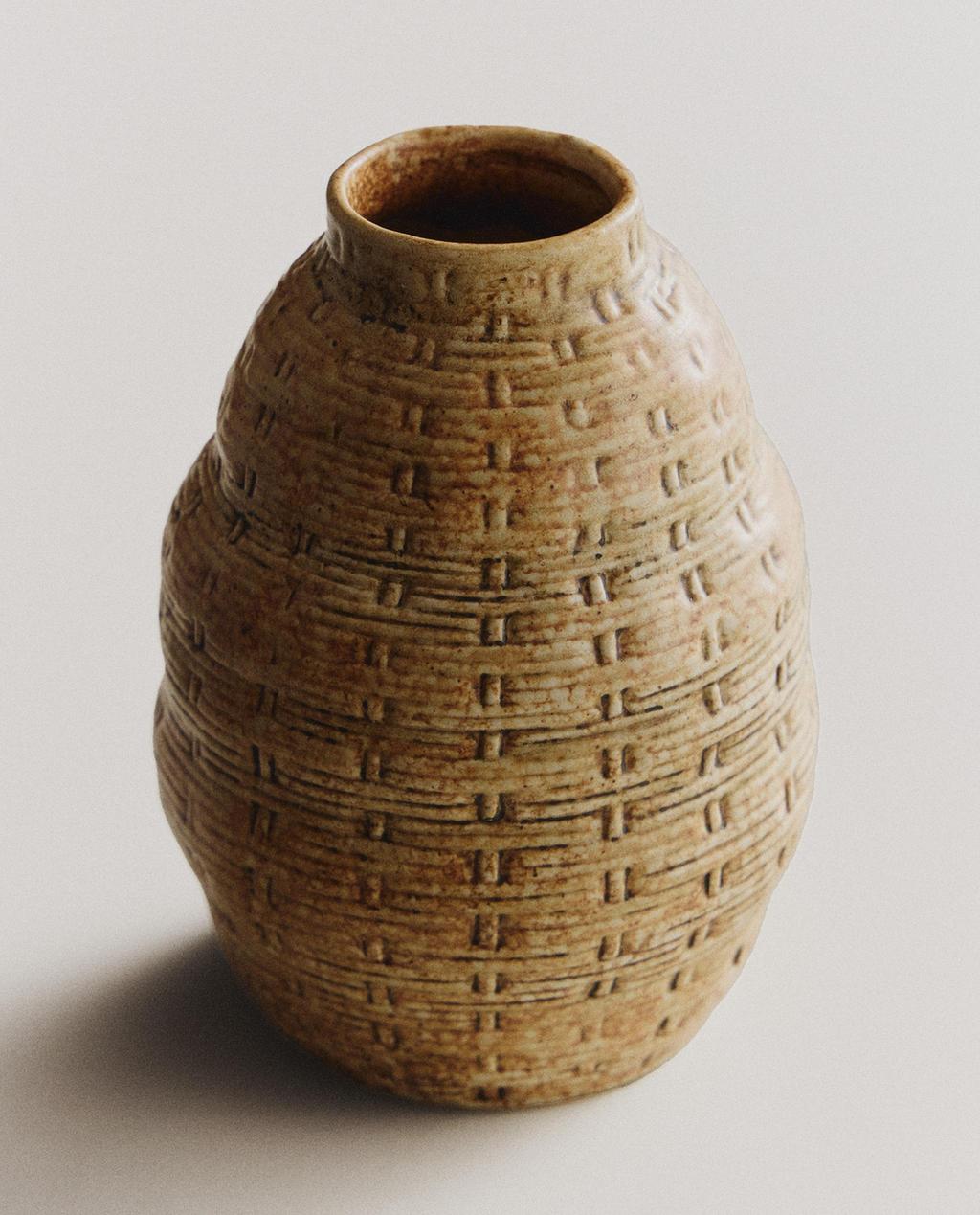 IRREGULAR CLAY VASE