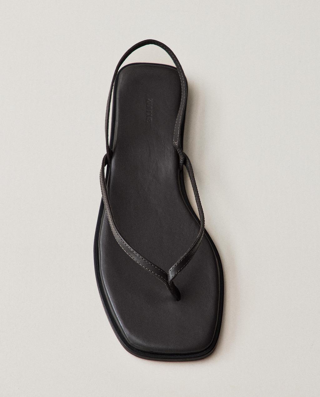 LEATHER SANDALS WITH ASYMMETRIC STRAPS