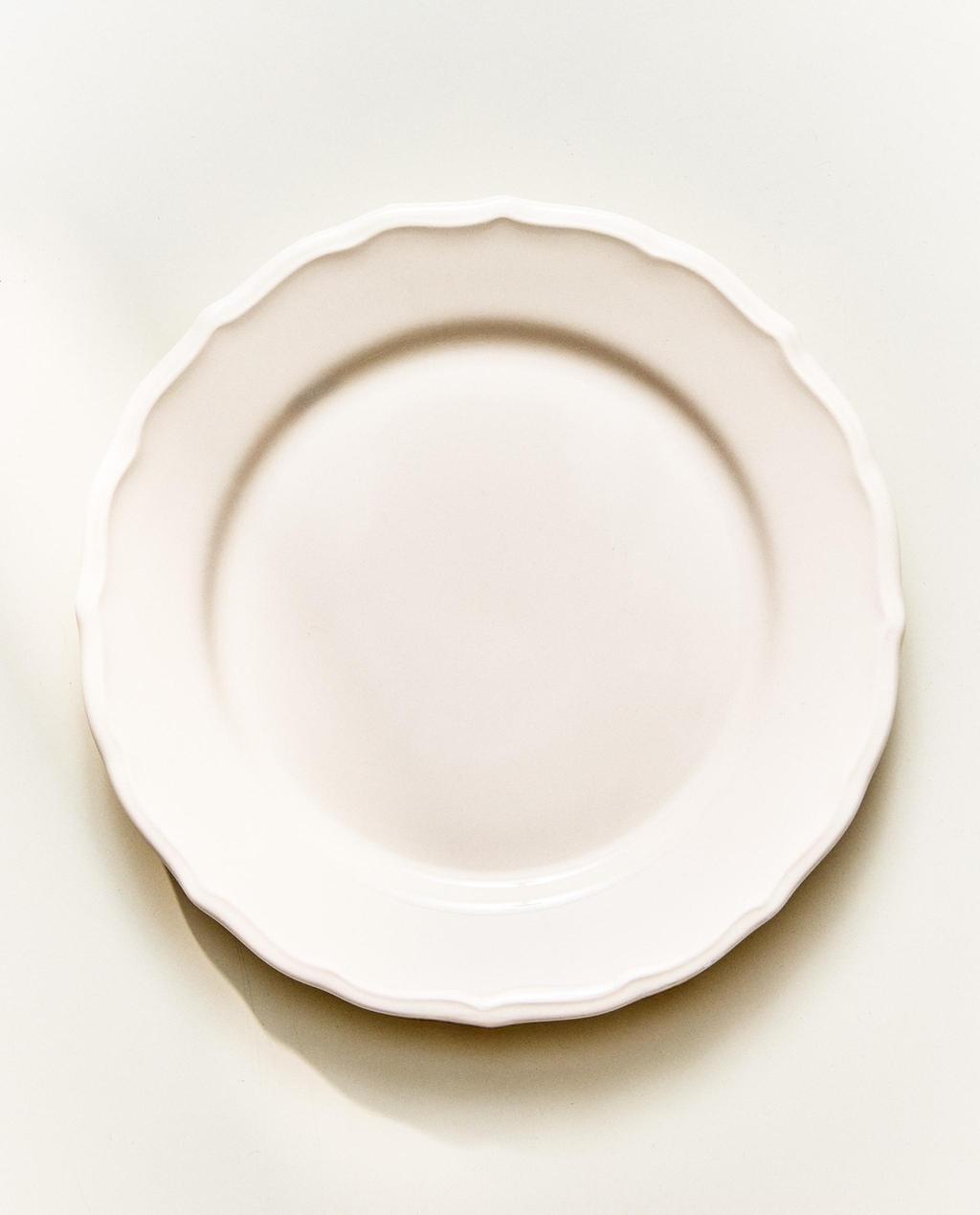 EARTHENWARE DESSERT PLATE WITH RAISED-DESIGN EDGE