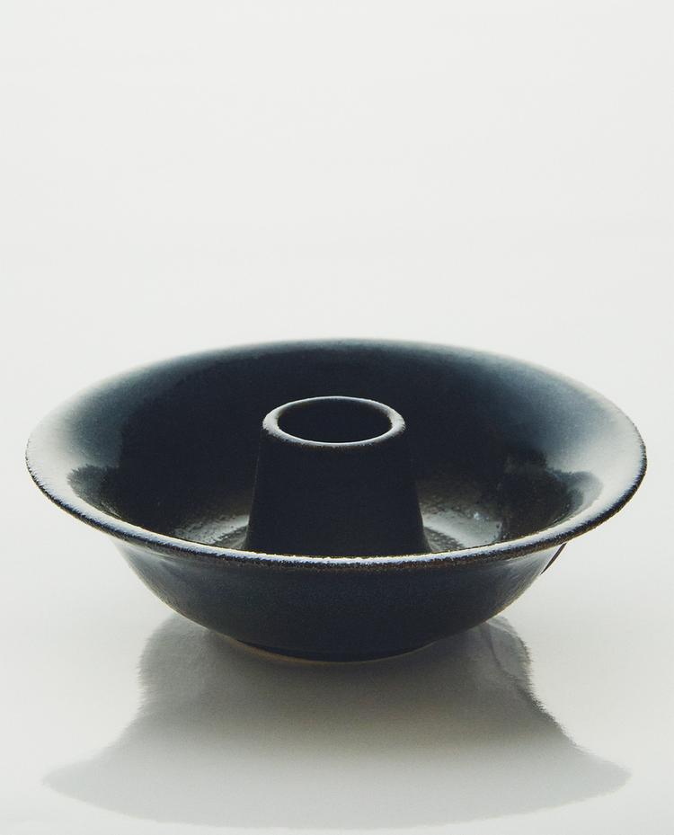 IRON AND STONEWARE CANDLEHOLDER