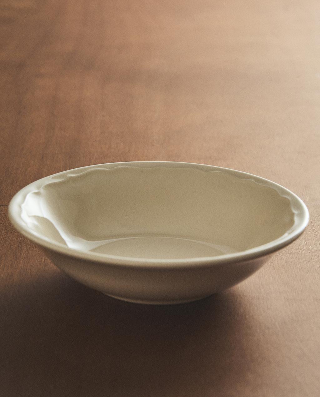 EARTHENWARE BOWL WITH RAISED-DESIGN EDGE