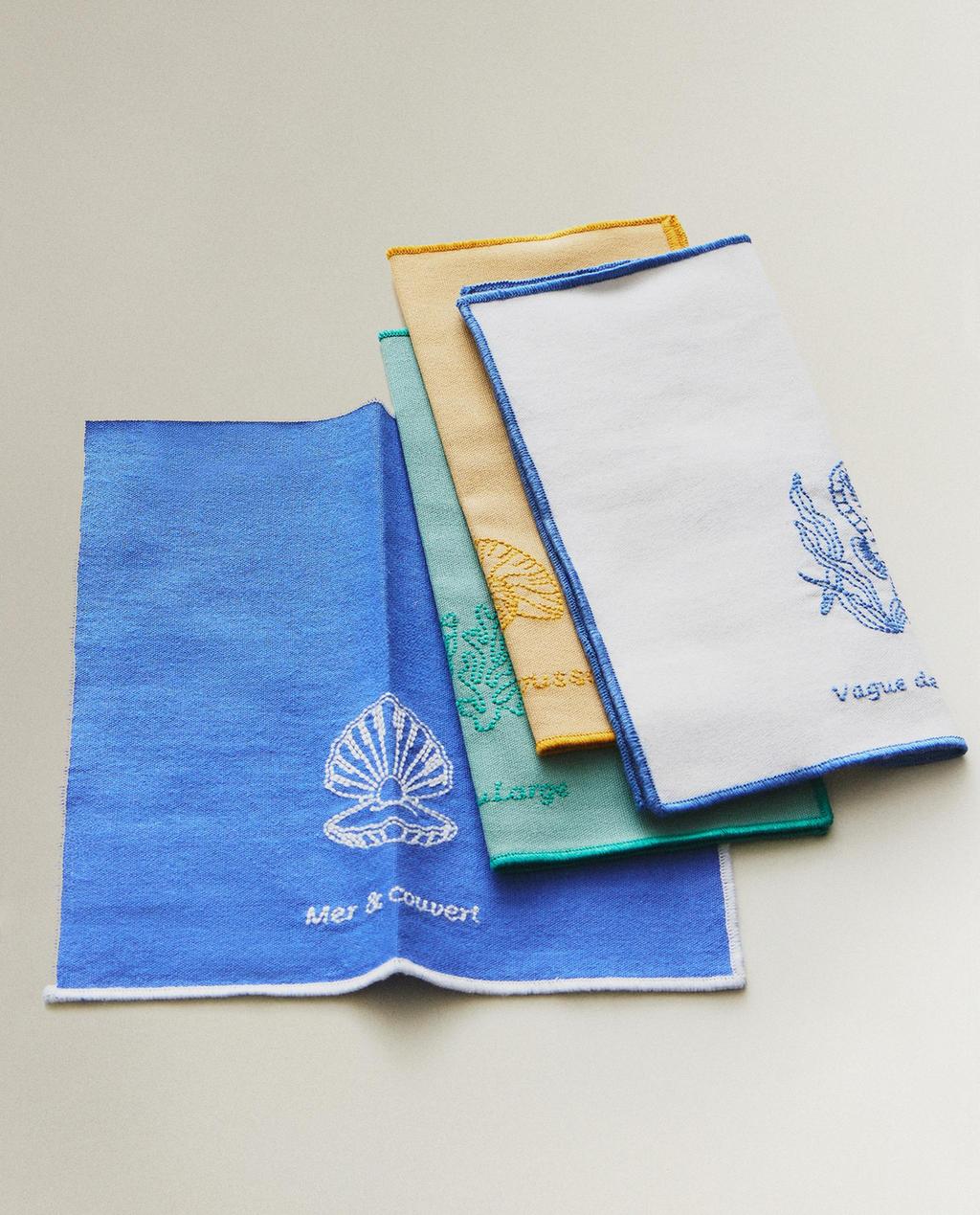 FLERPACK BRODERADE COCKTAILSERVETTER MED MARINT MOTIV (4-PACK)