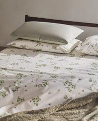 BETTBEZUG AUS BAUMWOLLE MIT KLEE- UND MARIENKÄFER-DESIGN