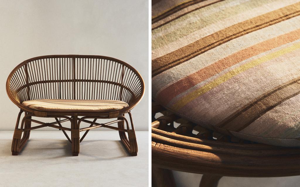 RATTAN COUCH AND STRIPED CUSHION