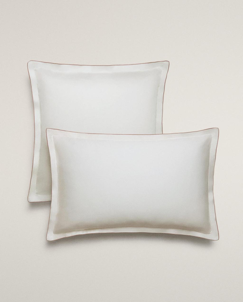 TAIE D’OREILLER SATIN OVERLOCK