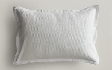 CUSHION COVER WITH RAISED DESIGN