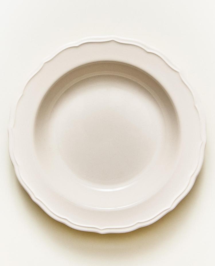 EARTHENWARE SOUP PLATE WITH RAISED-DESIGN EDGE