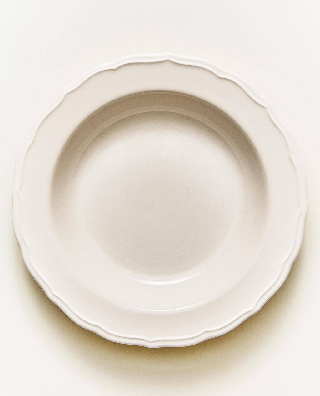 EARTHENWARE SOUP PLATE WITH RAISED-DESIGN EDGE