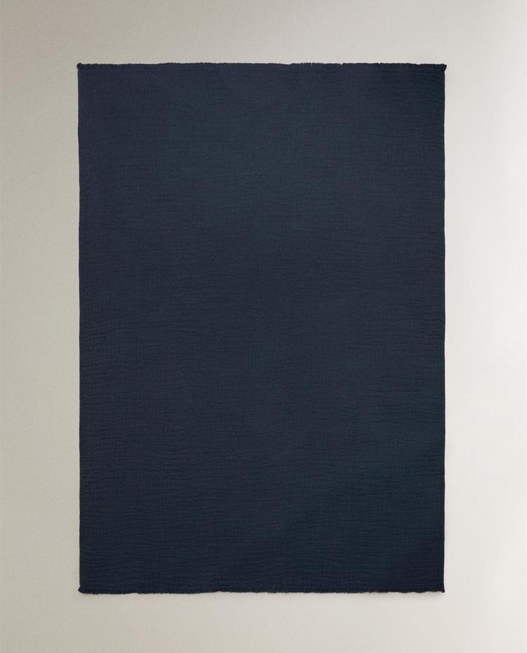 TEXTURED JACQUARD THROW