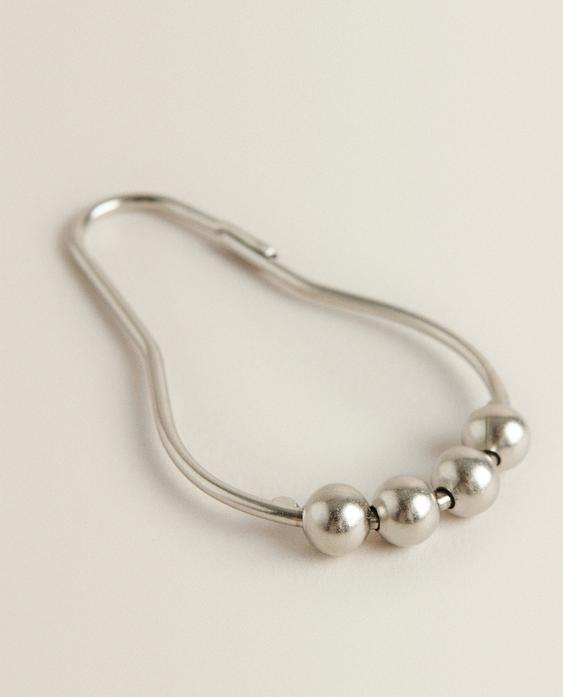 طقم حلقات معدنية لستارة الحمام (طقم من 12 قطعة)