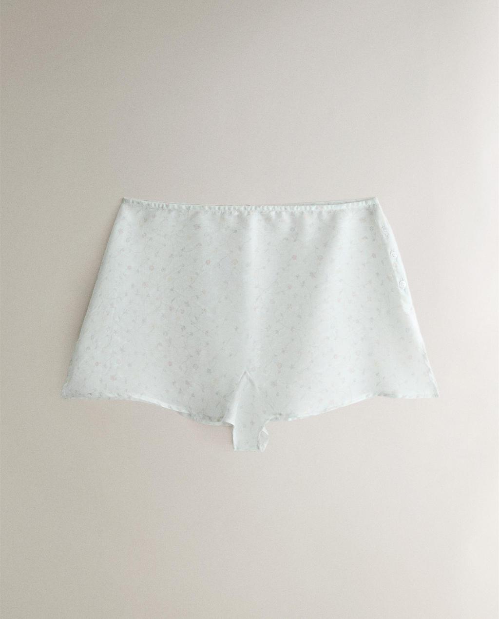 FLORAL SHORTS WITH SLITS
