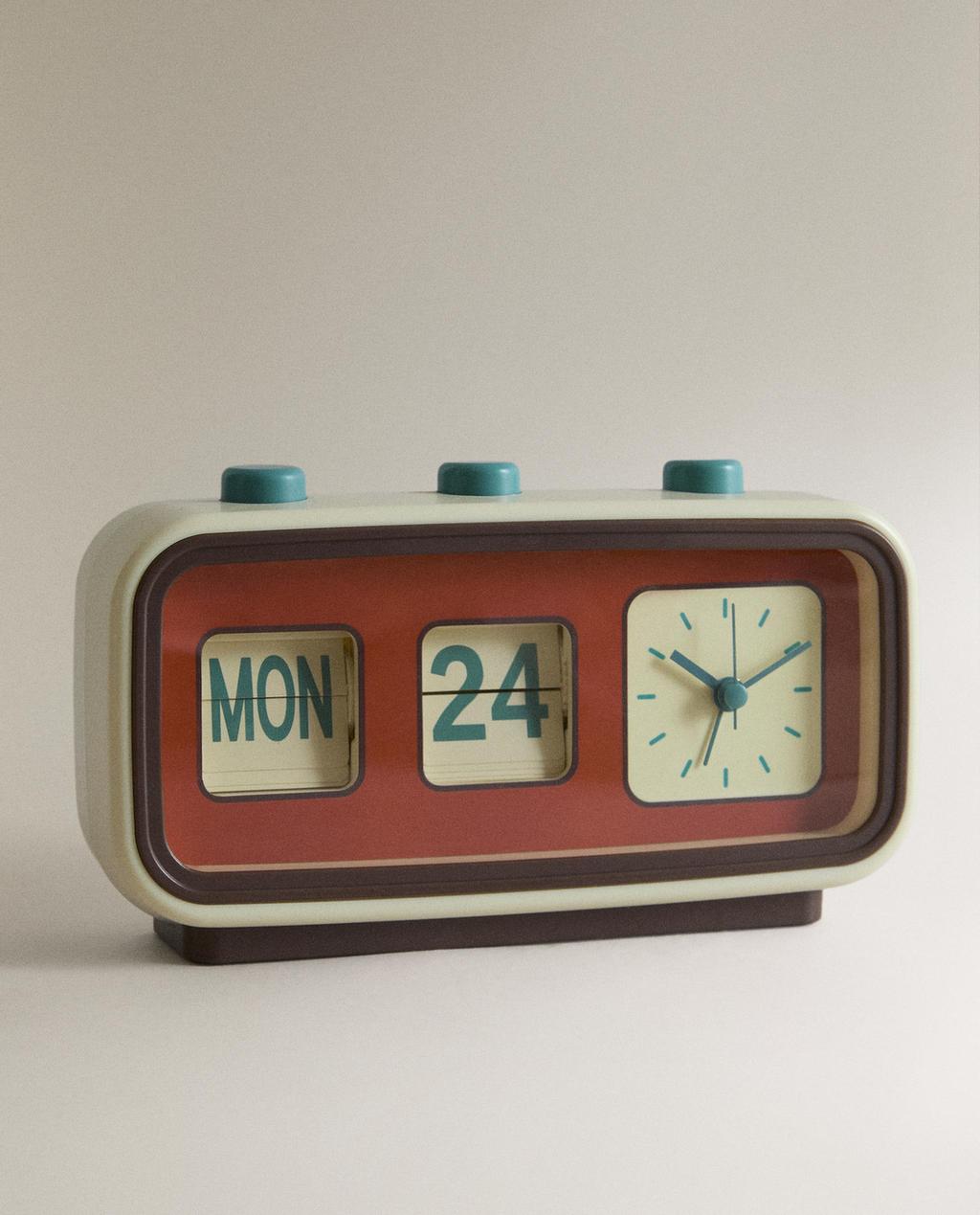 VÄCKARKLOCKA MED VÄNDBARA SIFFROR OCH KALENDER