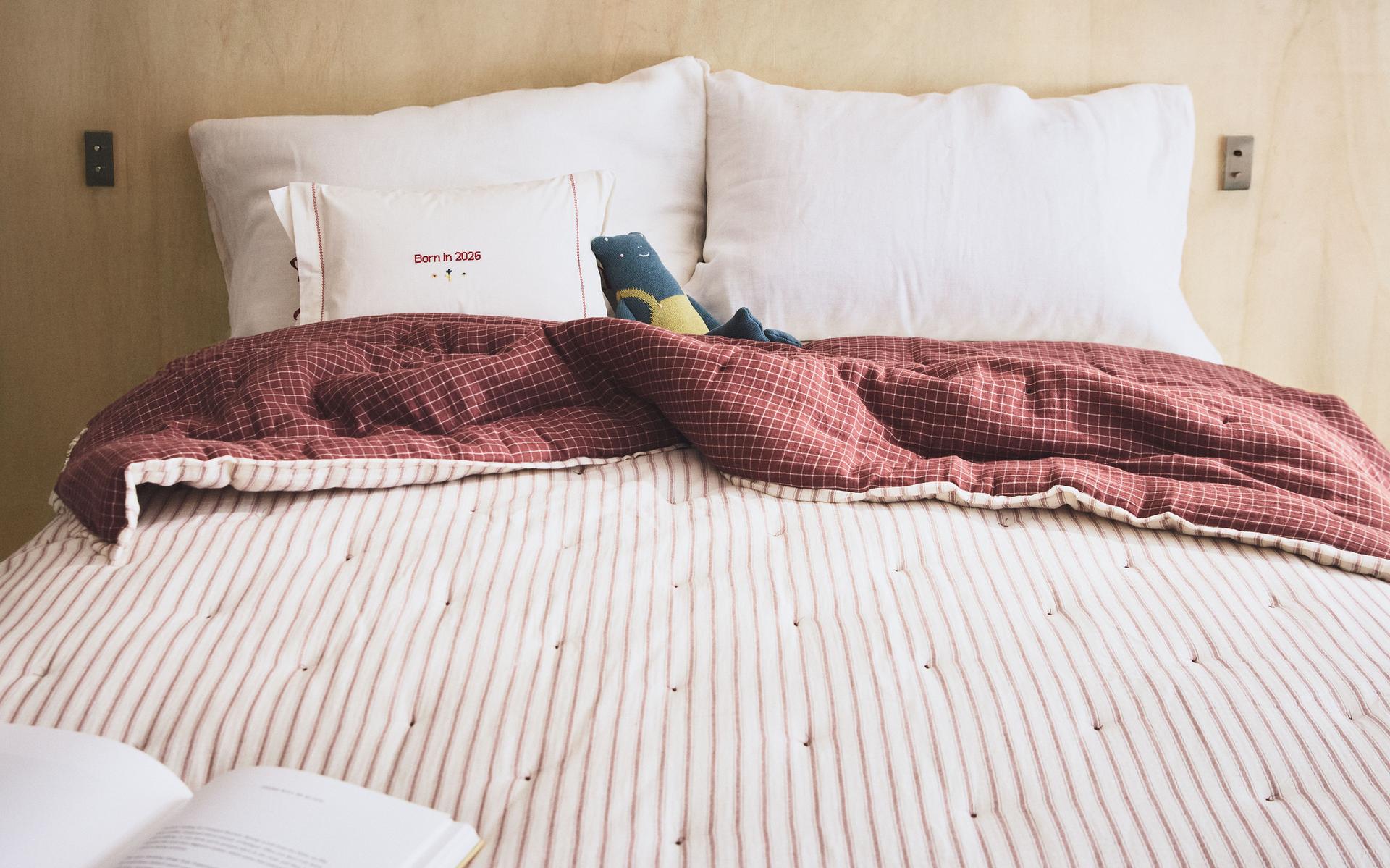 KIDS' REVERSIBLE CHECK AND STRIPE QUILT