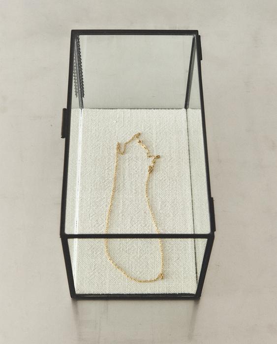 JEWELRY BOX WITH BLACK METAL BORDER