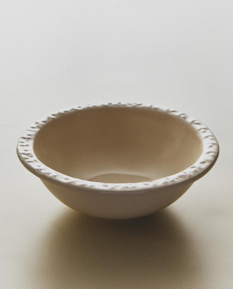 EARTHENWARE BOWL WITH RAISED-DESIGN EDGE