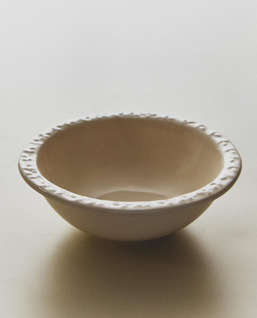 EARTHENWARE BOWL WITH RAISED-DESIGN EDGE