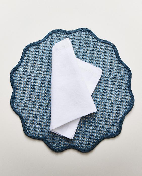 GELE PAPIEREN PLACEMAT MET BLOEMEN