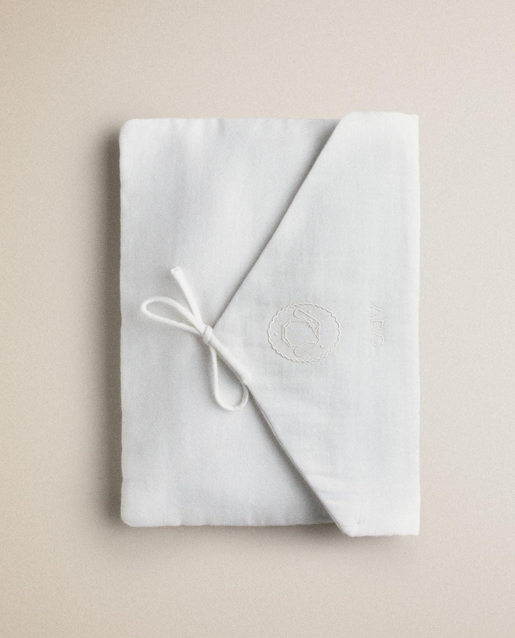 CHILDREN'S EMBROIDERED CLOTHING BAG
