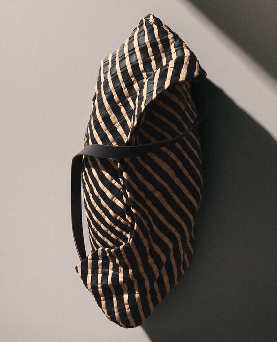 BRAIDED LEATHER CLUTCH