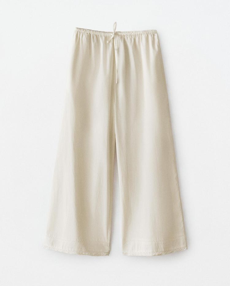 PLEATED TROUSERS