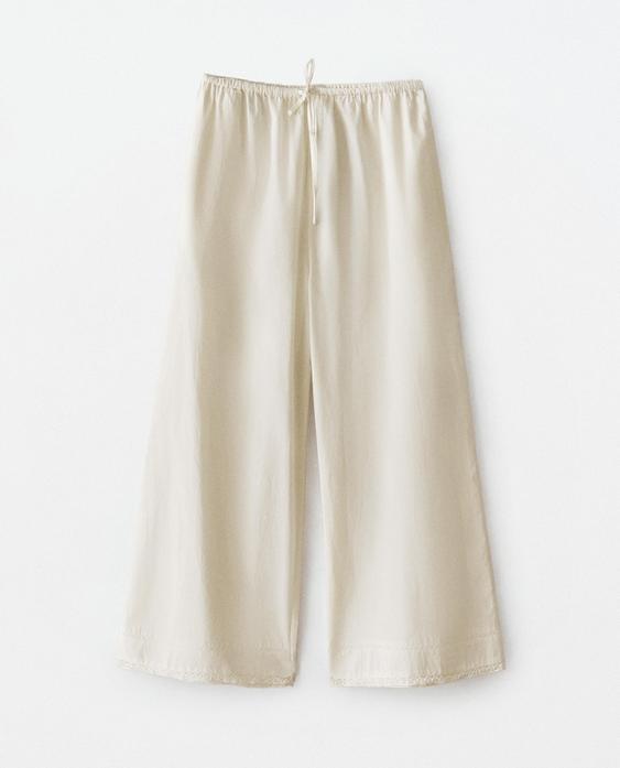 PLEATED TROUSERS