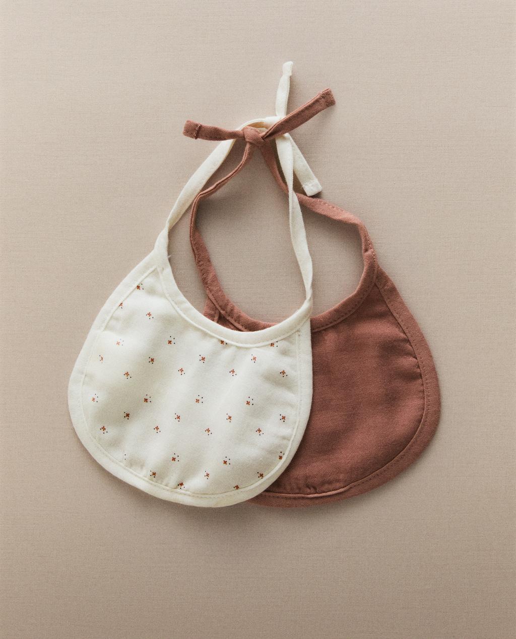 BABADOR DE BEBÊ COM FLOR (CONJUNTO DE 2)
