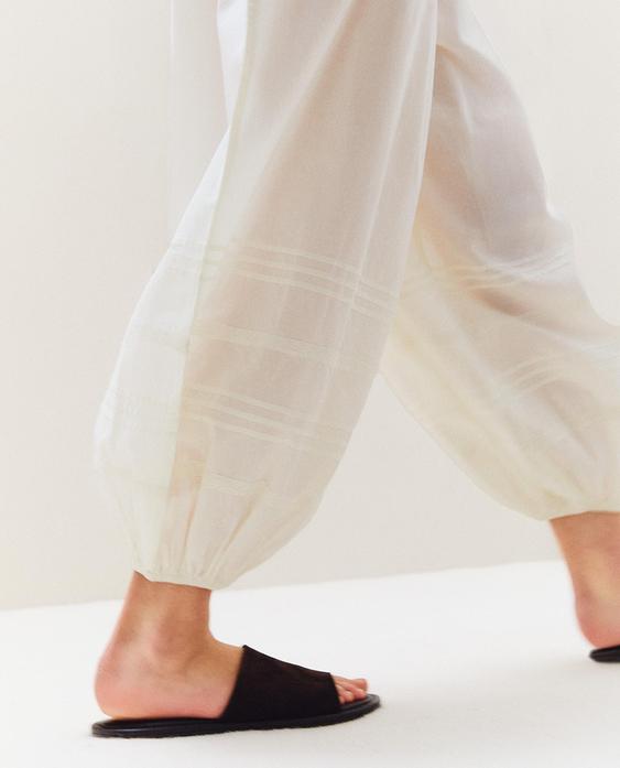 PANTALONI BUFANȚI CU DANTELĂ ȘI ȘNURURI