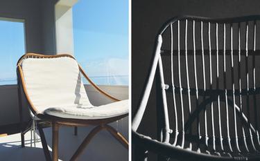 POLTRONA IN RATTAN E CUSCINO BIANCO