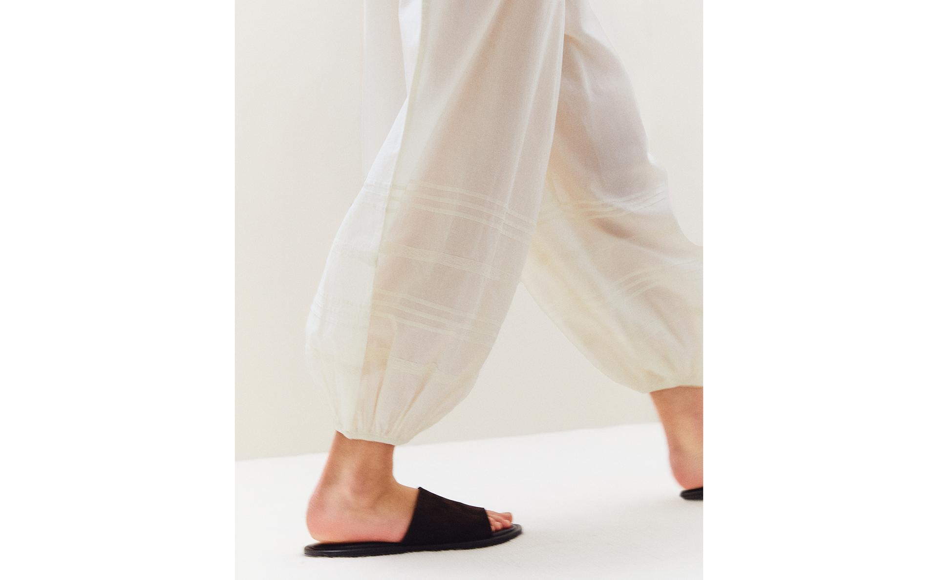 SMOCKED TROUSERS WITH LACE AND DRAWSTRINGS