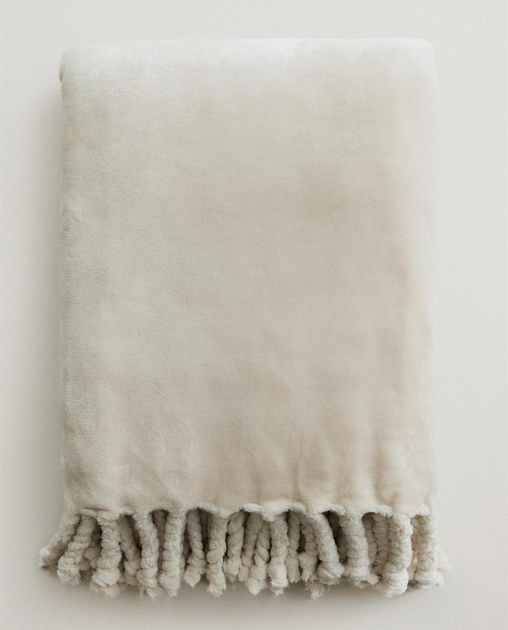 FRINGED FLEECE BLANKET
