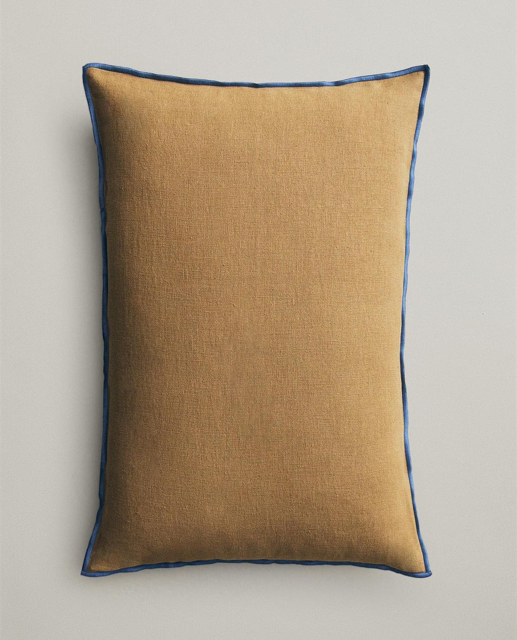 FUNDA COJÍN OVERLOCK