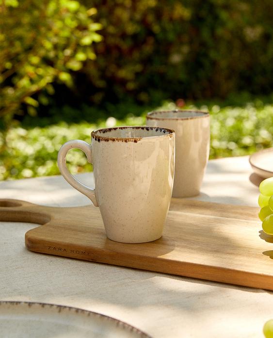 PORCELAIN MUG WITH ANTIQUE FINISH RIM
