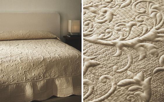 QUILT WITH RAISED DESIGN