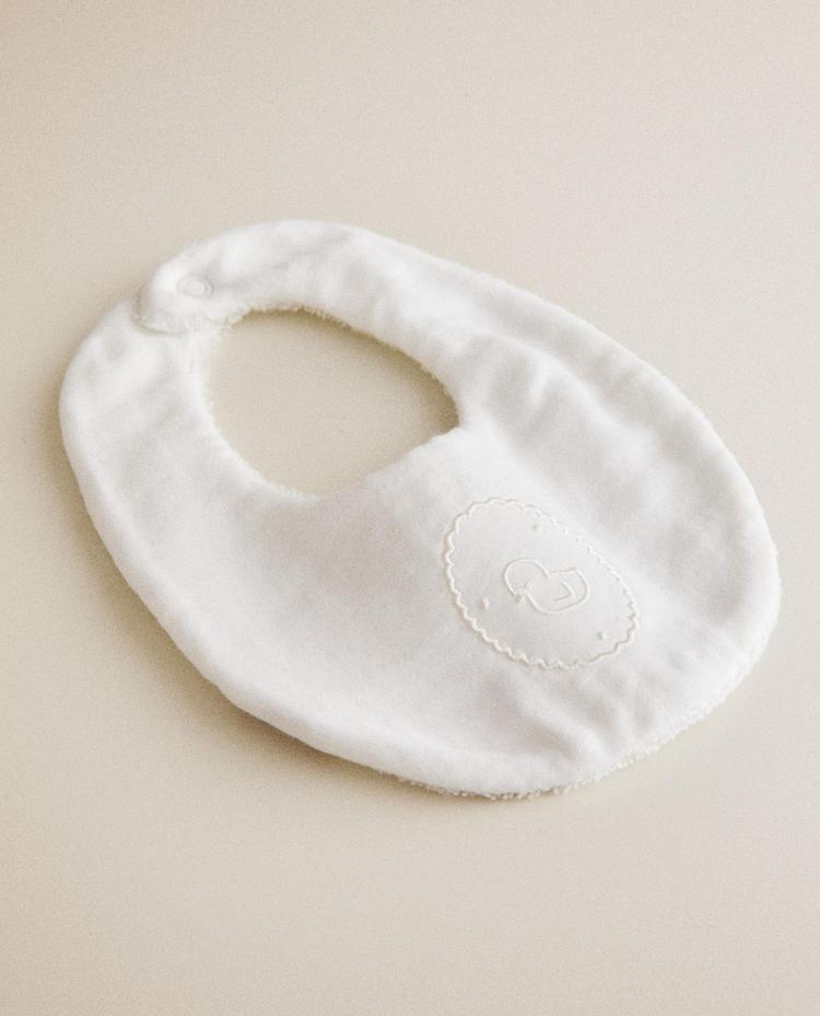 BABY BIB WITH EMBROIDERED CHICK