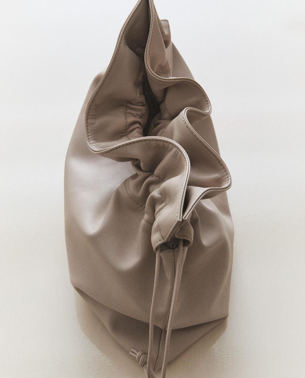 GRAND SAC POCHETTE EN CUIR