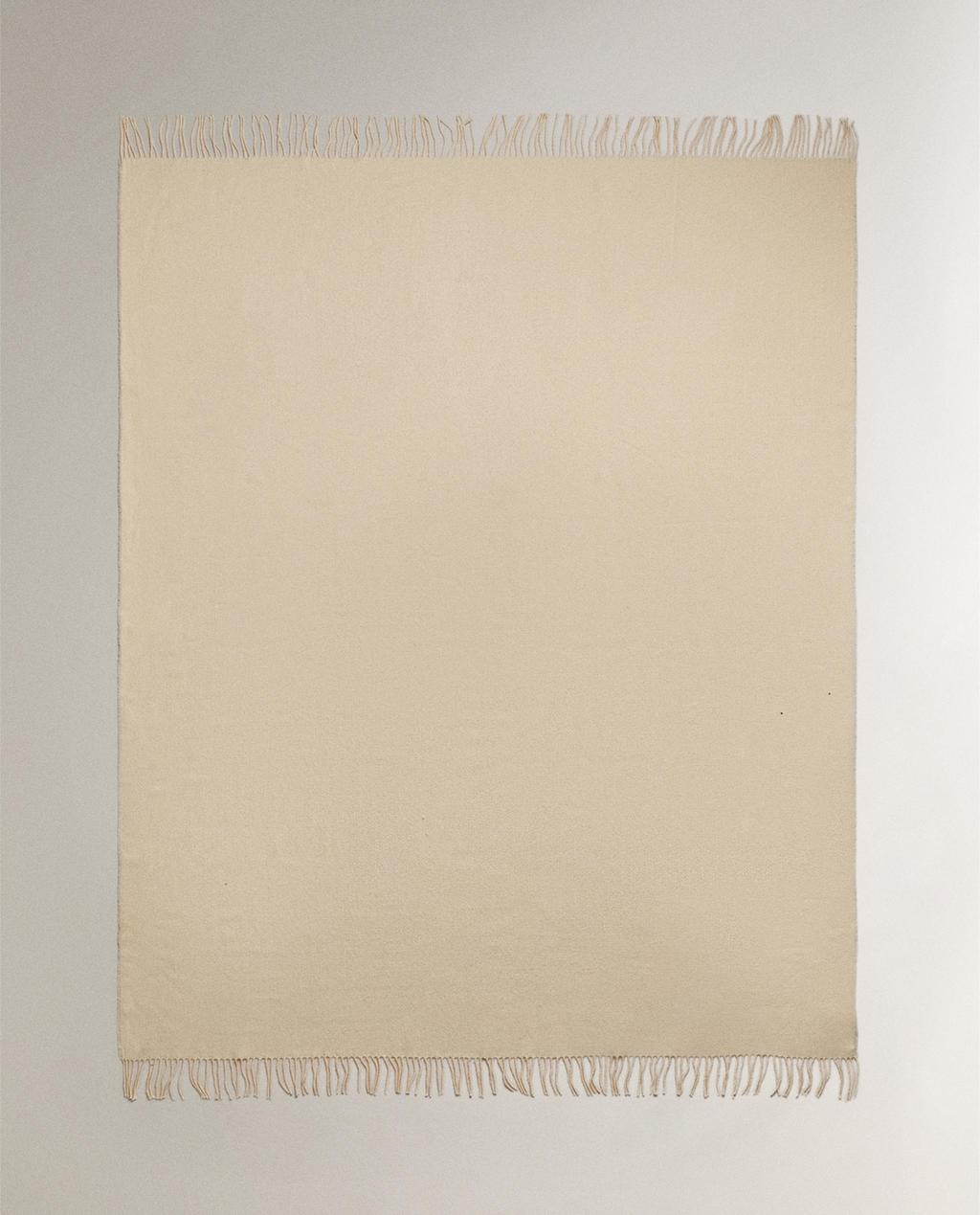 FRINGED DECORATIVE THROW