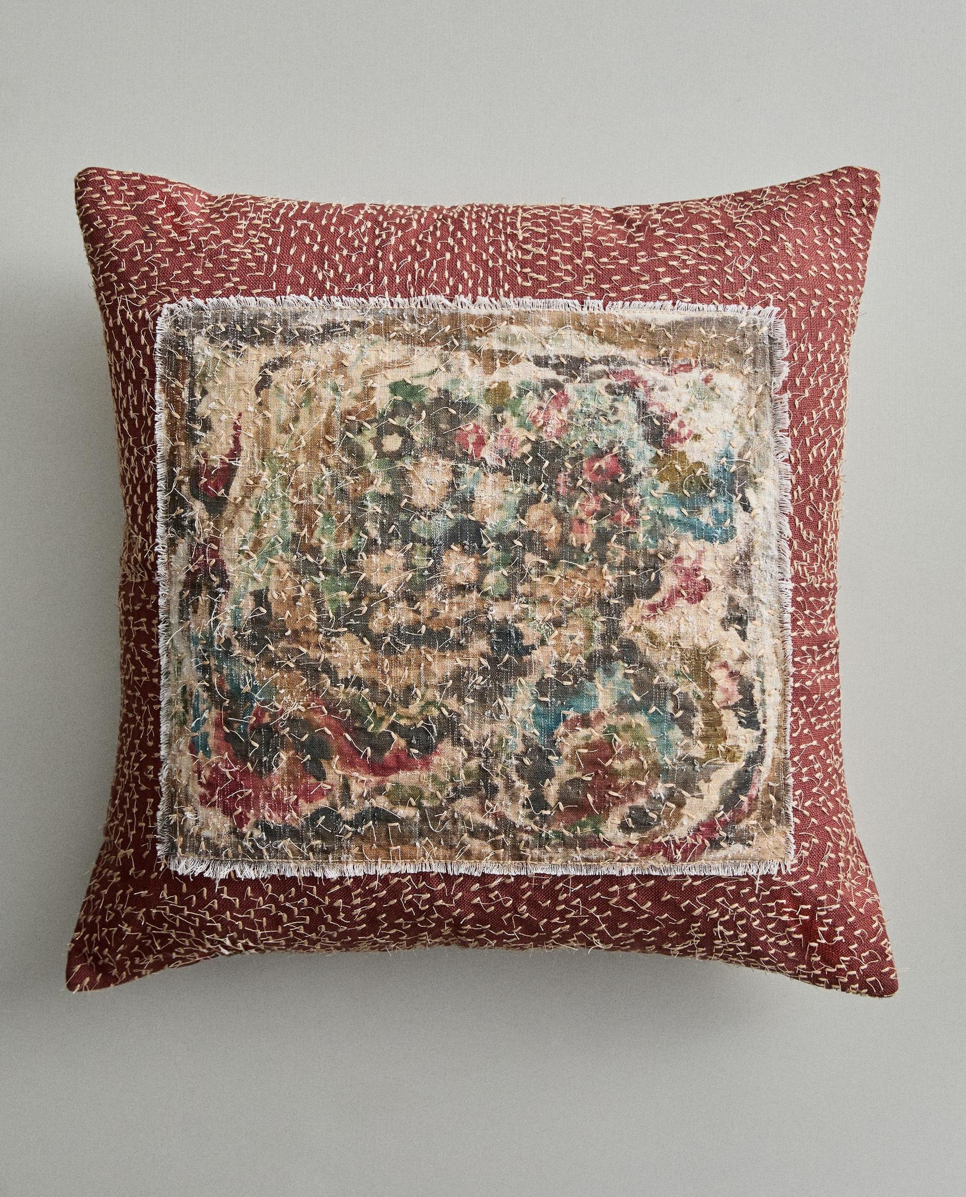 CUSHION COVER WITH APPLIQUÉ AND STITCHING