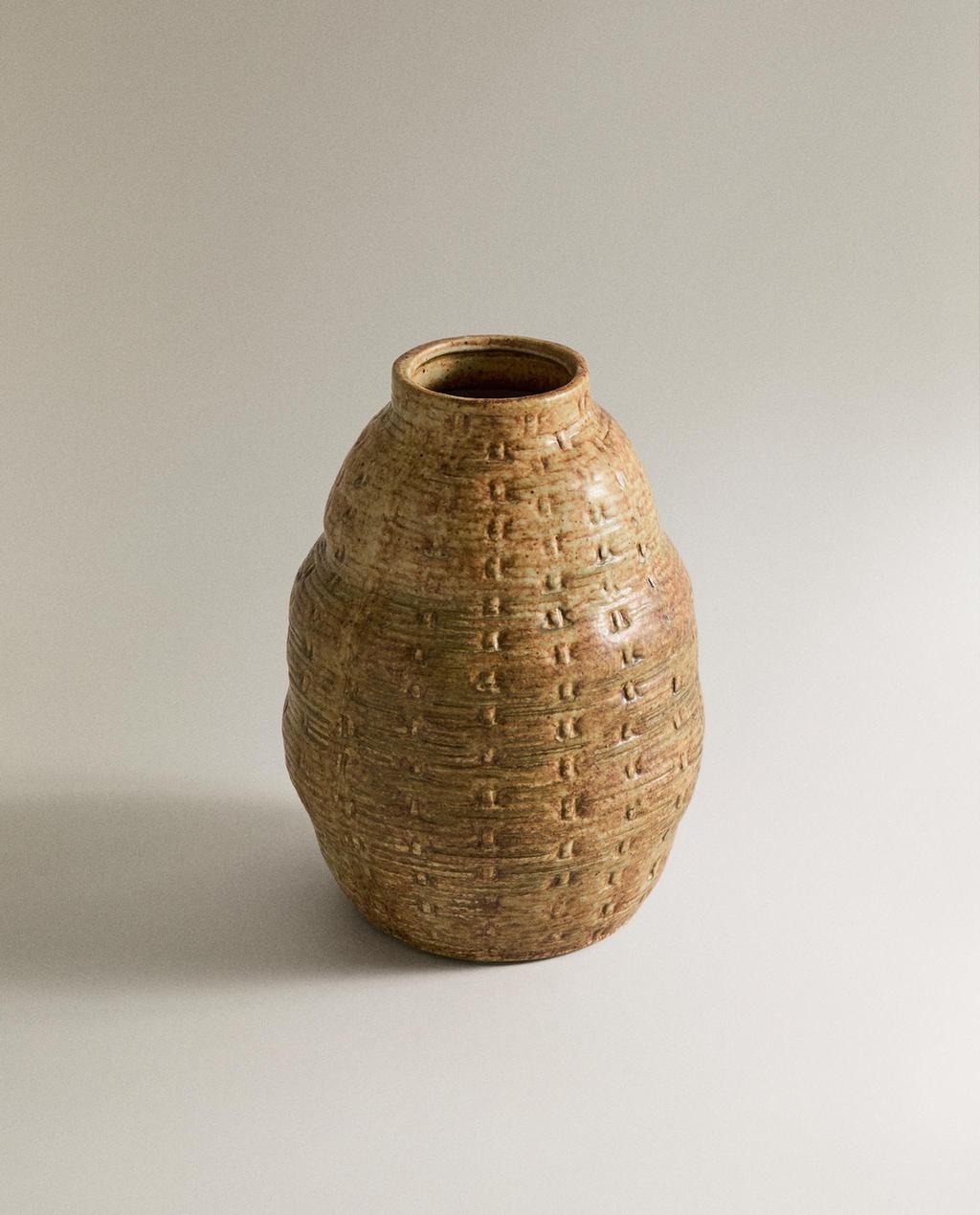 IRREGULAR CLAY VASE