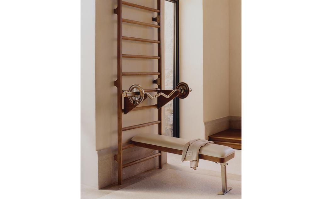OAK WALL BAR WITH A STAND FOR BAR AND WEIGHTS.