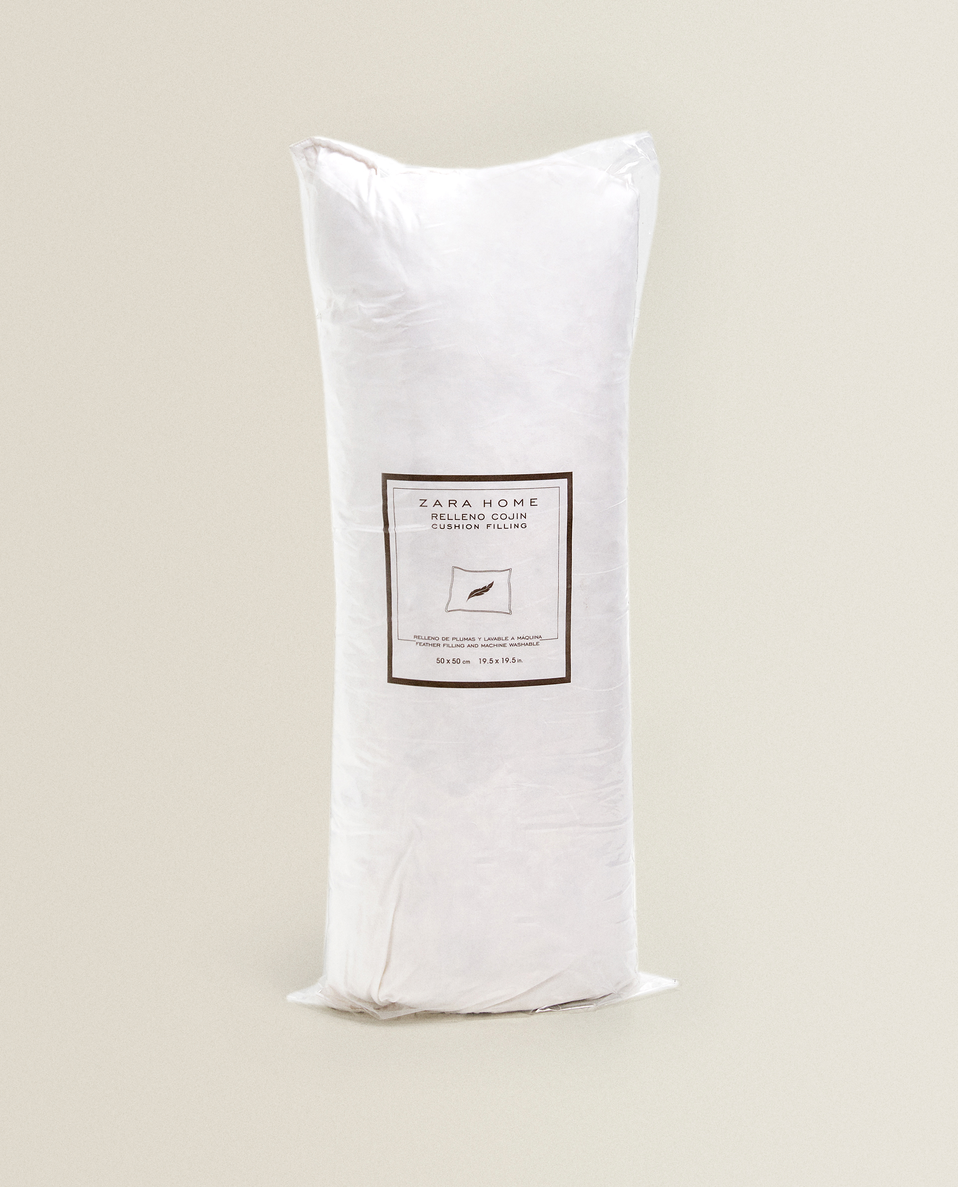 zara white feather cushion