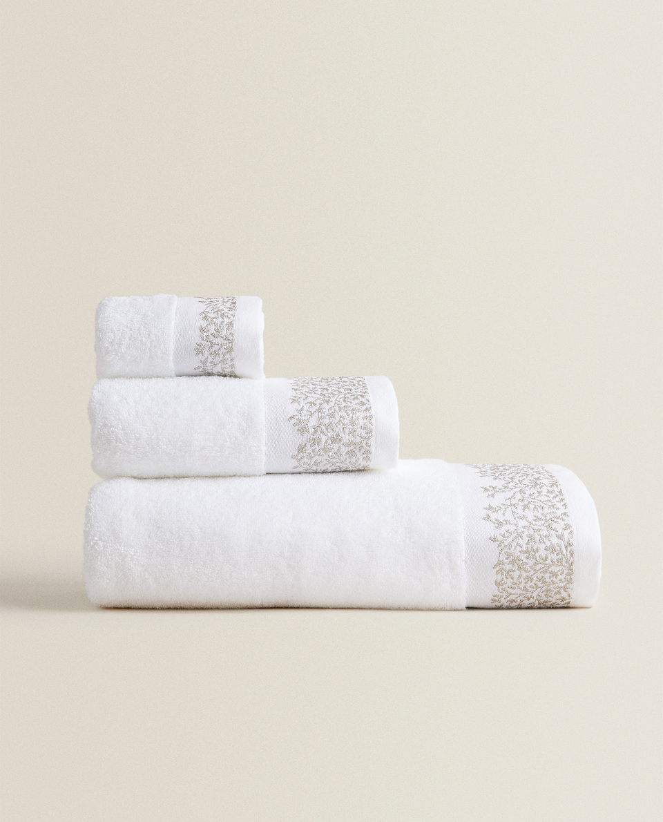 white towels with silver trim