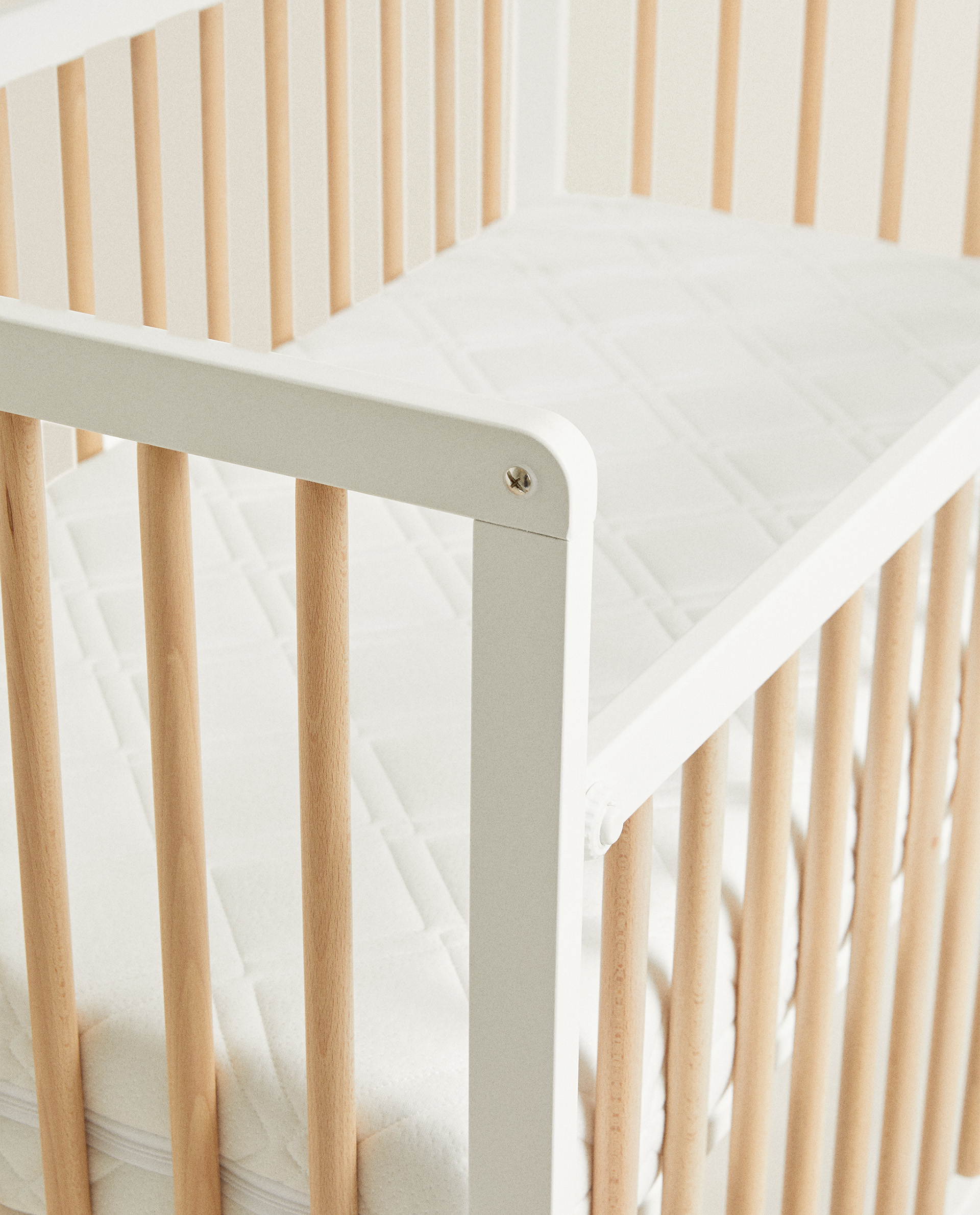 natural and white cot
