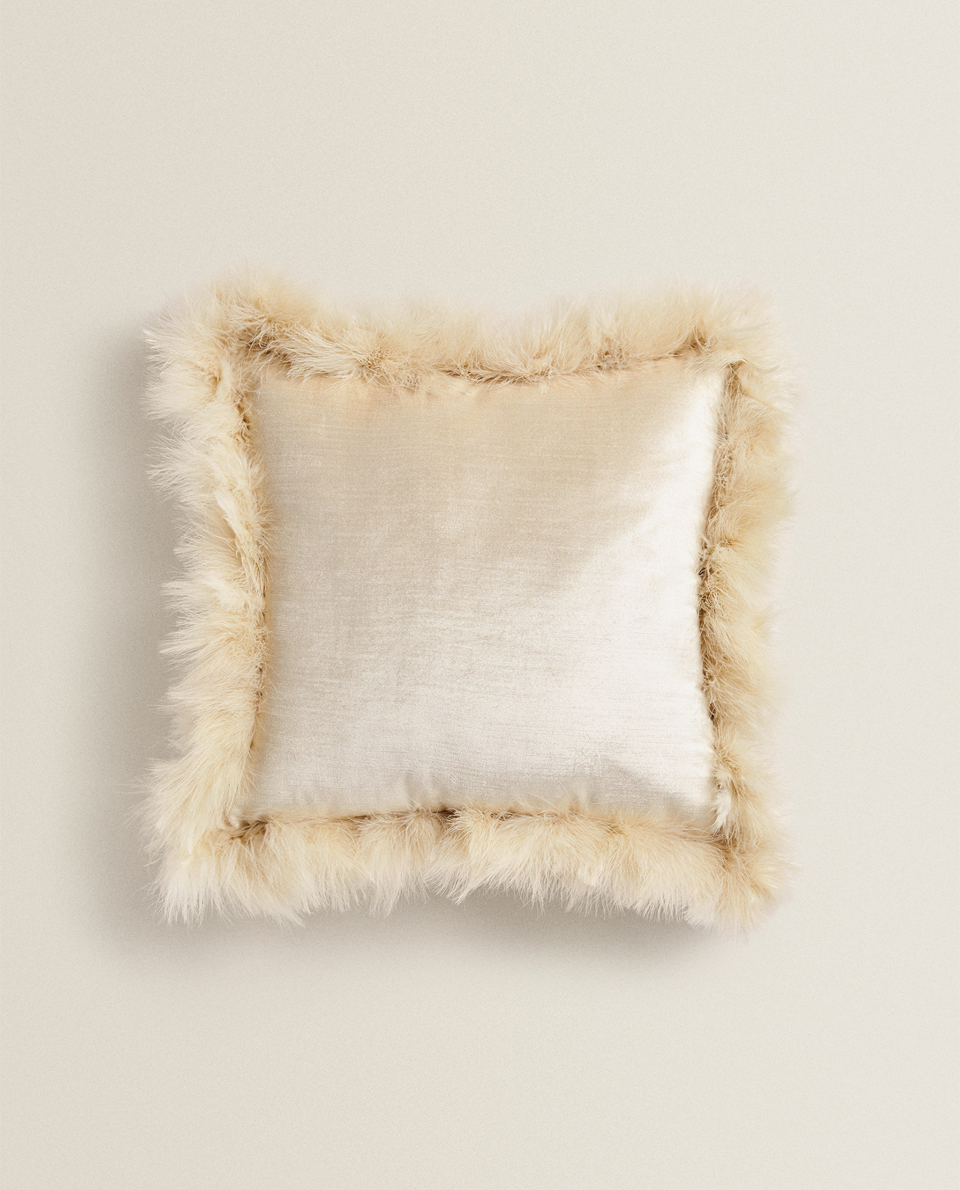 maglia con piume zara