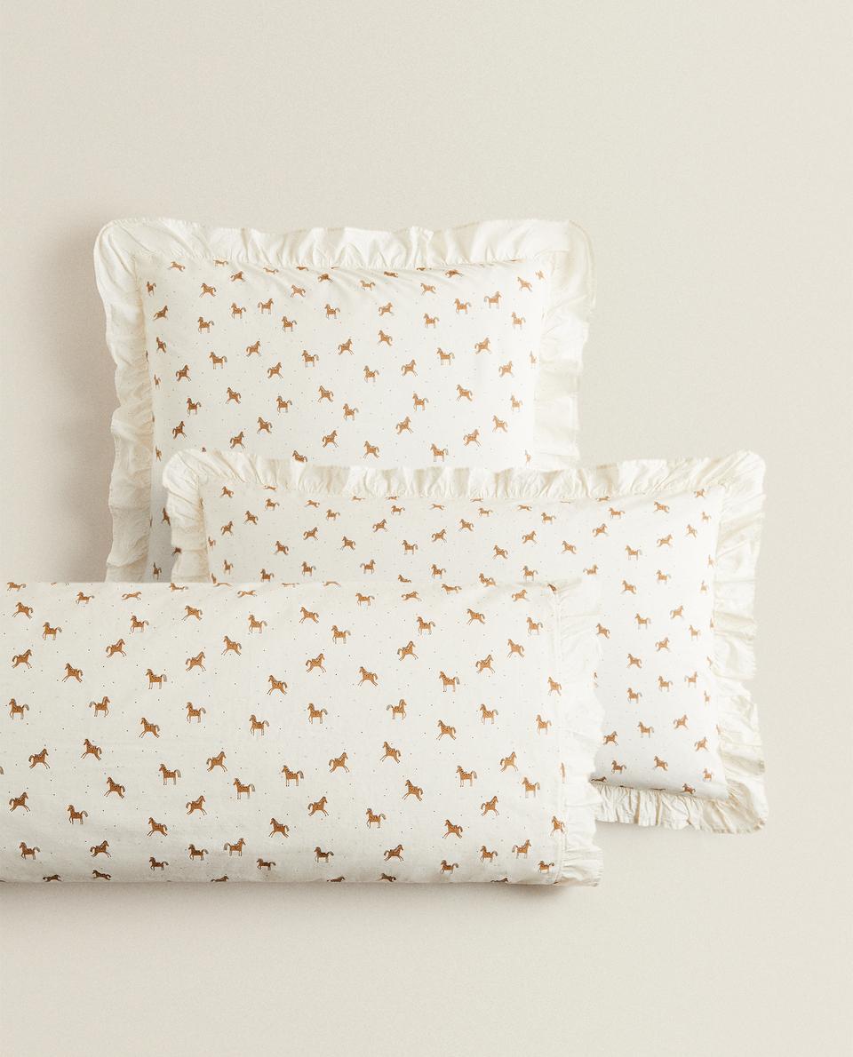PILLOWCASE WITH HORSE PRINT AND RUFFLE
