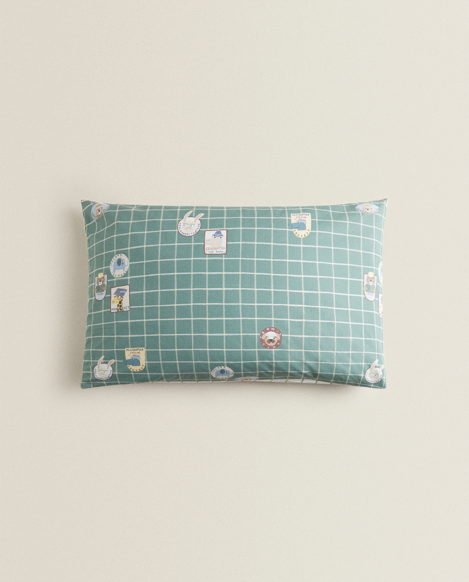 REVERSIBLE CHECK AND PATCH PILLOWCASE