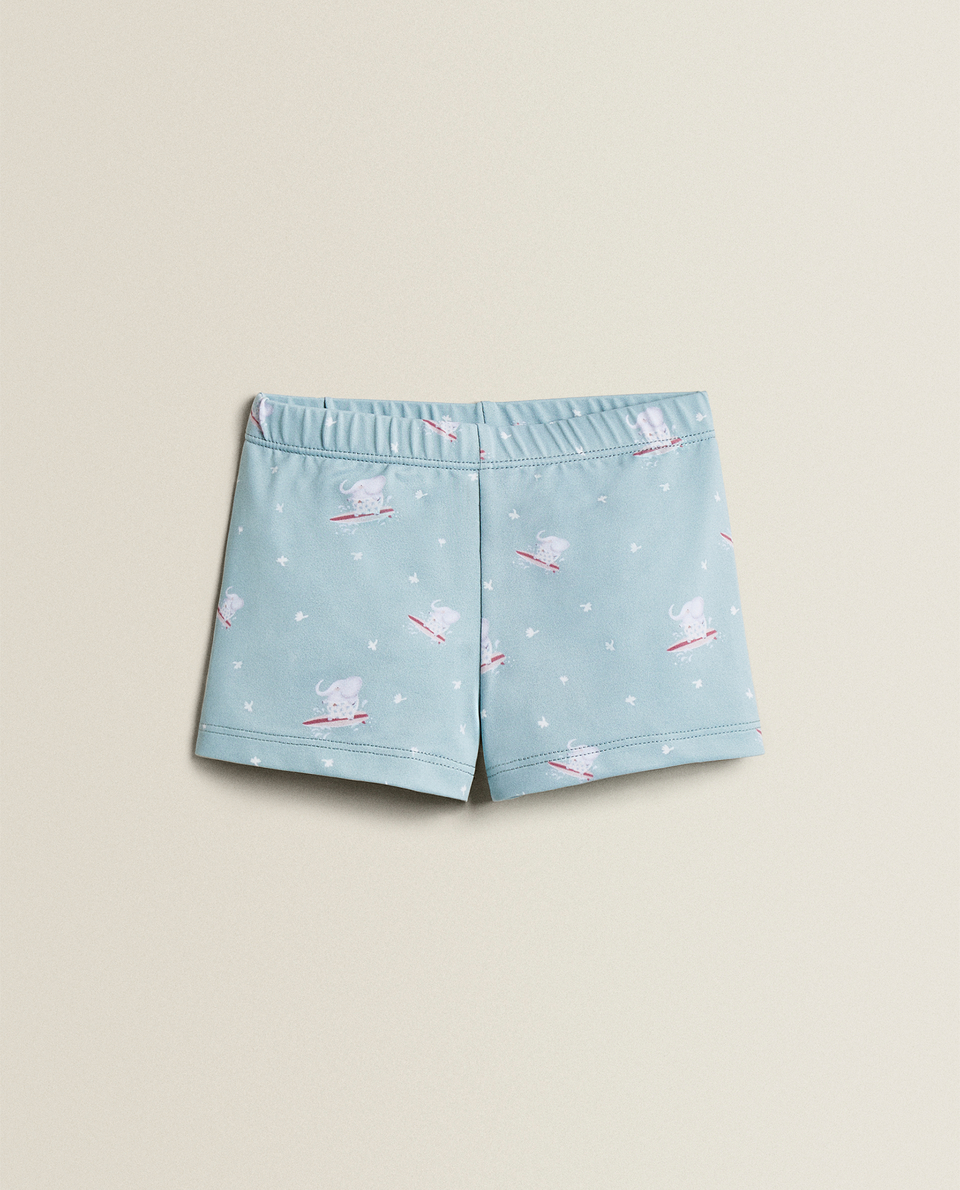 BLUE SWIMMING TRUNKS WITH ELEPHANT PRINT