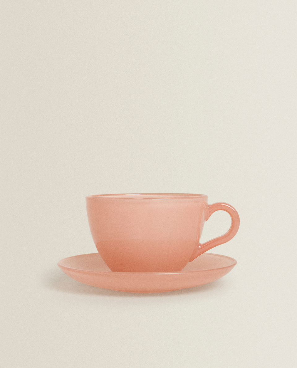 PASTEL-COLOURED GLASS COFFEE CUP AND SAUCER