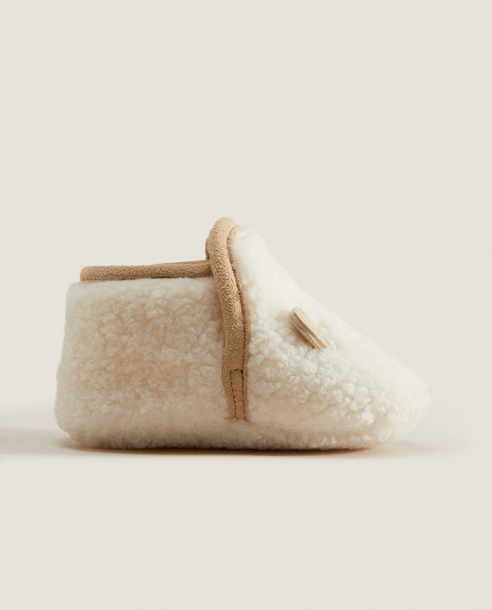 Fuzzy leather booties with ear details
