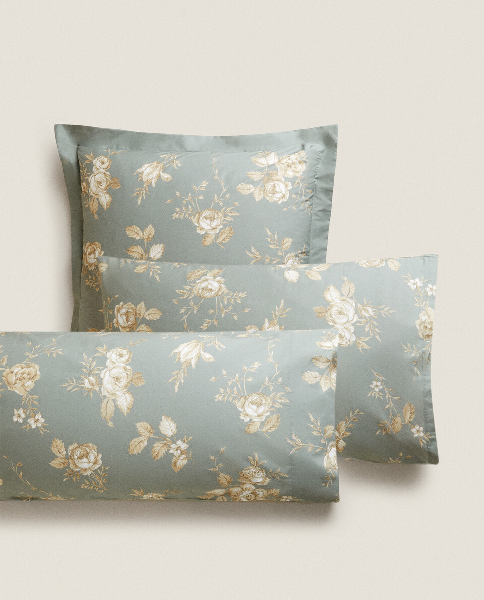 GREEN PILLOWCASE WITH GOLDEN FLORAL PRINT