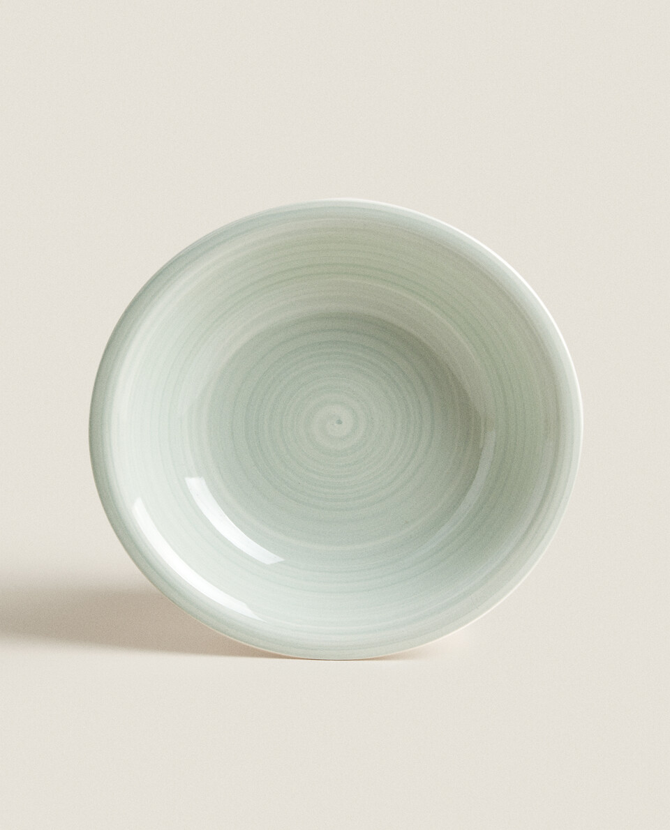 EARTHENWARE SOUP PLATE WITH SPIRAL DESIGN